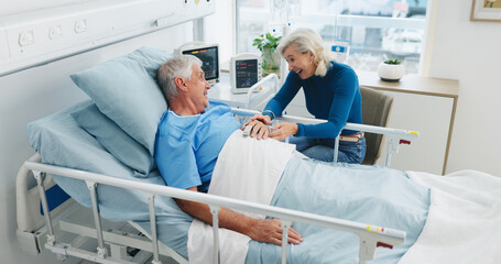 Happy, old couple and conversation by hospital bed for support, compassion or empathy for recovery....