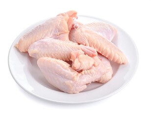 A plate of raw chicken wings on a white background