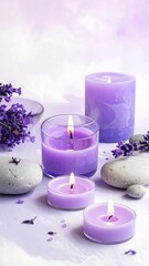 Calming still-life composition of candles, lavender, and stones