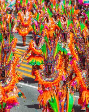 People in Marimonda Costumes Parade Through the Street During a Vibrant Carnival Celebration Featuring Traditional Masks and Colorful Outfits for Cultural Promotion
