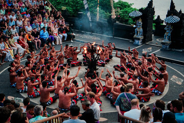 Traditional Balinese Kecak Dance Performance at Sunset with Audience © Akhmad