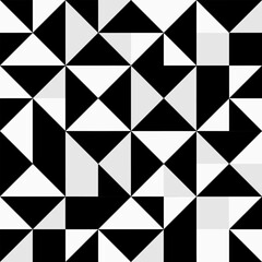 Obraz premium Seamless abstract geometric pattern background with black, white, and grey triangles and squares.