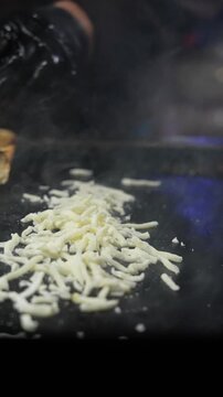 torta bread, slow motion, taco stand, mexican street food, grilling bread, melting cheese, hot griddle, sandwich prep, taqueria, street vendor, food close up, culinary process, handmade torta, toasted