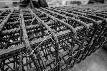 Shallow depth of field (selective focus) details with reinforcing bars (rebar) on a construction...