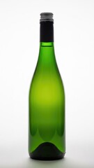 Single empty green glass bottle on white background isolated on white background