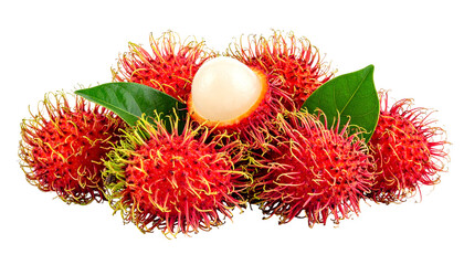 Close-up of several spiky red and yellow fruits with green leaves. One fruit is cut open, revealing white flesh