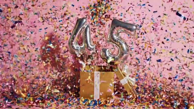 45th Birthday Celebration with Confetti and Gift.