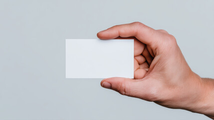 Obraz premium Business card hand blank white minimal close up isolated person human fingers palm skin holding object empty identity communication paper rectangle horizontal office professional template design