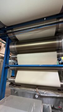 Textile mercerizing machine processing fabric in industrial factory