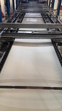 Textile mercerizing machine processing fabric in industrial factory
