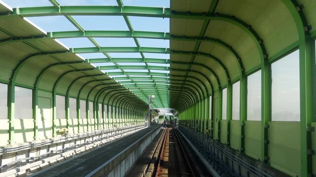 Taichung MRT train arriving at Daqing elevated station, Taiwan