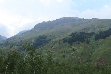 Obraz premium mountain landscape of the North Caucasus mountains near Mount Elbrus on a sunny summer day
