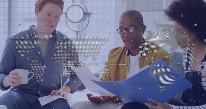 Team unfolding folder, leaning and reviewing documents while map graphics displaying business team