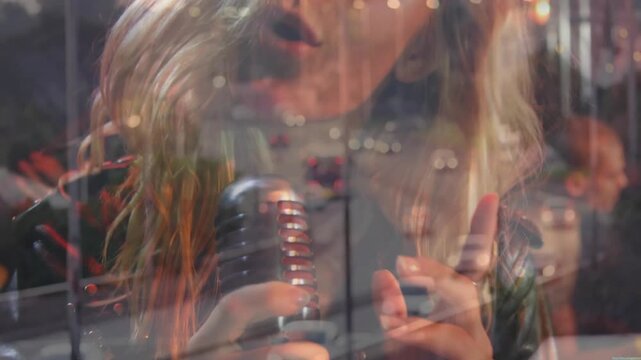 Music performance vocalist raising mic to lips and singing key lyrics while highway lights pulsing