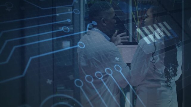 IT technicians fixing network cables and activating circuit overlay by pressing server button