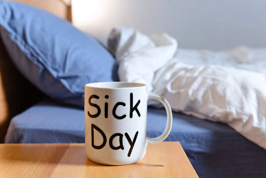 Sick Day Comfort: Cozy Bedroom with Coffee Mug and Blanket for Rest and Self-Care