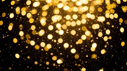 Golden bokeh lights on black background.