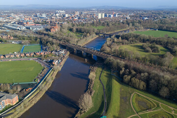 Fototapeta premium Aerial view of the River Ribble and West Coast Main Line viaduct in Preston, Lancashire. 