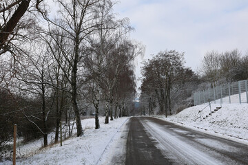 Fototapeta premium A snowy winter road in January