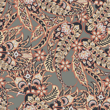 Turkish Cucumber Paisley seamless vector pattern in traditional Oriental style. Decorated with flowers, leaves, and fantasy elements, for fabric, textile and wallpaper covers