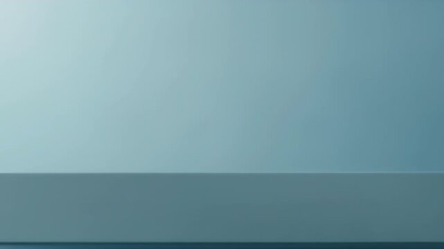 A sleek, minimalist animation features a solid, rectangular block, pedestal, or prism in a soothing, uniform light blue hue. Initially standing tall on a matching surface against a soft, monochromatic