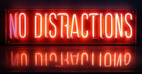 Bright red neon sign displays message. Reflection visible below, creating symmetrical effect. Dark background emphasizes glowing text.