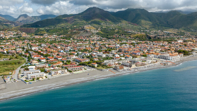 Aerial view of Tortora Marina, located in province of Cosenza, Calabria, Italy. It is a small coastal town on the Tyrrhenian Sea and a popular summer tourist destination. Mountains are in background.