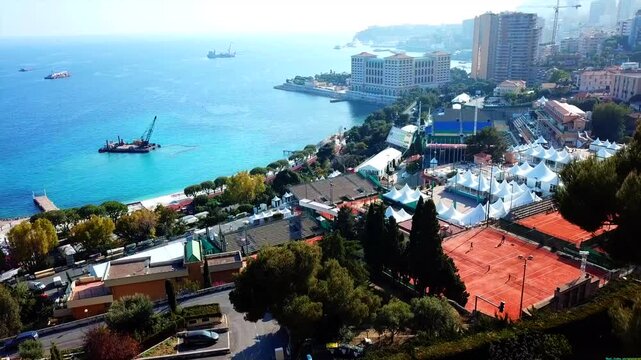 Monte Carlo, Monaco - Cityscape Skyline, Sea Landscape - Cinematic Sky View Discover the magnificence of Monte Carlo, in the heart of Monaco, France. Enjoy breathtaking sea views of the French Riviera