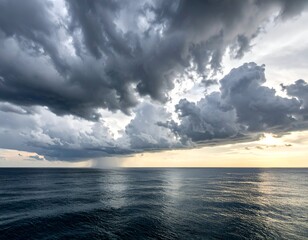 Dramatic view of a dark, ominous storm cloud looming over a calm ocean, casting shadows on the water