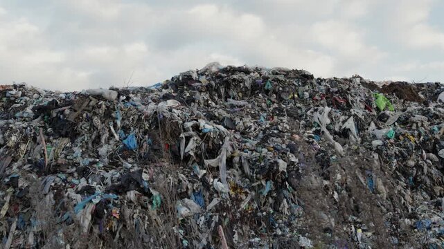 A large landfill reveals the overwhelming amount of garbage and pollution affecting our planet. Recycling efforts are more important than ever