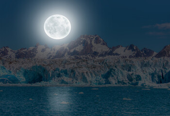 Melting icebergs by the coast of Greenland, Full Moon in the background - Knud Rasmussen Glacier near Kulusuk - Greenland, East Greenland  "Elements of this image furnished by NASA" © muratart