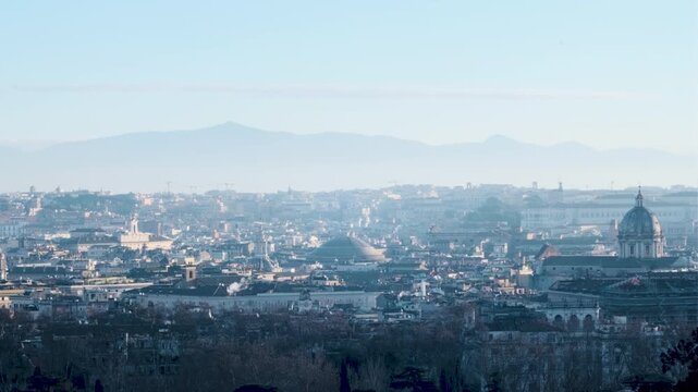 Rome winter sunrise skyline from Gianicolo with Pantheon roof, Quirinale, and Montecitorio, smoking chimneys, 4K