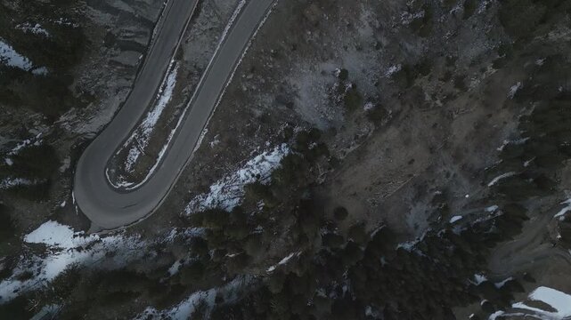 4K Drone Bird&rsquo;s-Eye View Revealing Hairpin Mountain Roads and Cars Over Forested Cliff