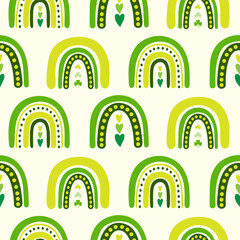 Naklejka premium Seamless pattern of hand drawn Irish rainbows, clovers and hearts. Design for St. Patrick's day celebration, party decoration, scrapbooking, home decor, textile, print, paper crafts.