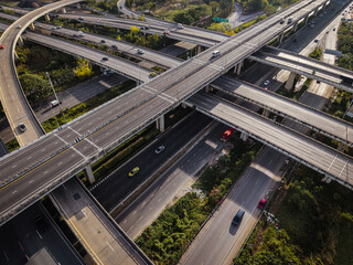 Aerial view city transport junction cross modern road morning light with vehicle movement