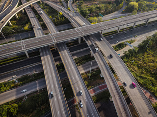 Aerial view city transport junction cross modern road morning light with vehicle movement