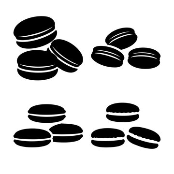 Classic black and white macaron cookie icon set with sweet dessert silhouettes