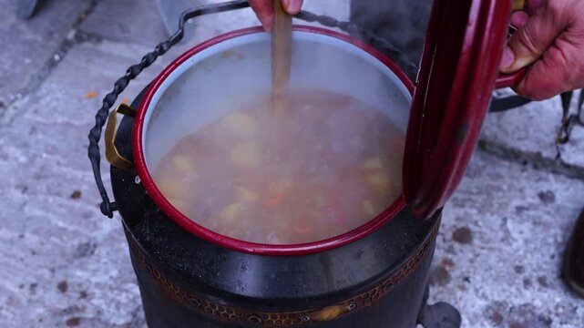 Traditional stew cooked in a "railway pot" in Reinosa, in the Campoo-Los Valles region. Cantabria. Spain. Europe