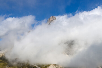 Close‑up of jagged mountains fading into fog