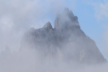 Close‑up of Cadini di Misurina mountains under misty skies