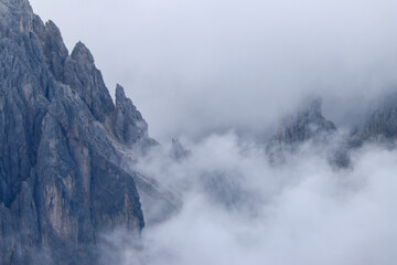 Detail view of Cadini di Misurina peaks veiled in clouds