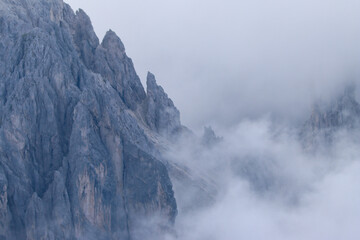 Cloud‑covered Cadini di Misurina massif in the Dolomites