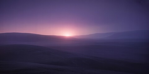 Fototapeta premium Serene mountain landscape at sunset with purple hues and misty atmosphere
