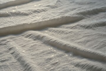 Soft White Fabric with Gentle Waves and Subtle Light Reflections