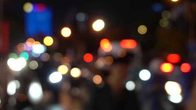 Asia, Vietnam , Ho Chi Minh,  blurred lights of city traffic . Congested traffic of cars and scooters on the streets of Saigon night  - Air pollution PM10 and fine particles above the permitted thresh