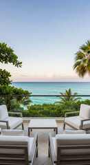 Naklejka premium Outdoor view of a balcony with white chairs overlooking the ocean. Represents relaxation, travel, and tropical escape, perfect for vacation.