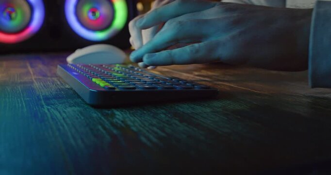Slow Motion Close Up Of Hands Using Digital Music Controller At Night With Colorful Lights, Home Studio Lifestyle And Creative Hobby Concept