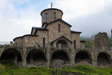 Obraz premium Cathedral of the Iveron (Mozdok) Icon of the Mother of God in the Alan Assumption Monastery on a cloudy October day. Hidikus, North Ossetia-Alania. Russian Federation