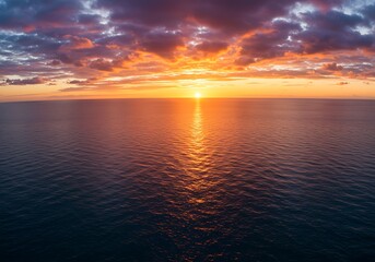Obraz premium 水平線に燃える夕焼け