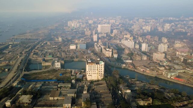 Aerial View of Urban Cityscape and Industrial Port Activity in Chattogram 4k